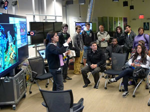 Saura Naderi trains staff from SMCC and Casa Familar on how to use the OptIPortable