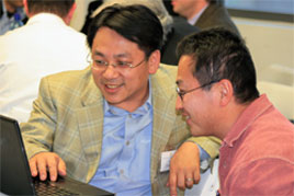 Paul Blair and student demonstrating the device