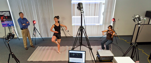 Paul Blair and student demonstrating the device