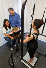 Paul Blair and student demonstrating the device