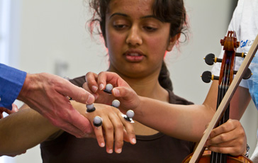 Paul Blair and student demonstrating the device