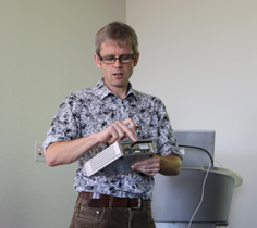 Paul Blair and student demonstrating the device