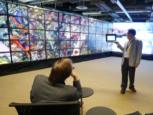 Dr. Jun Murai of Keio University and Calit2's Dr. Peter Arzberger, principal investigator for the Pacific Rim Application and Grid Middleware Assembly (PRAGMA), work with a team abroad using IRBC networks.  