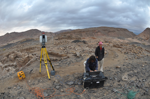 Connor Buitenhuys assists Calit2's Tom Wypych as they scan a 10-hectare area of Khirbat en-Nahas down to the millimeter level, collecting 1.75 billion data points to create a robust 3D immersive environment.