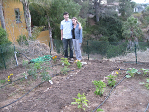 Aaron and Jesica pose with their garden