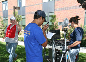 Paul Blair and student demonstrating the device