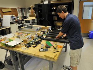 Electrical engineering student Andrew Permenter assembled a cluster of digital signs. 