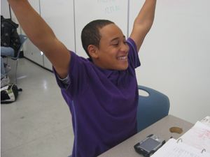 Estimate accepted! A student at High Tech High reacts after giving entering a correct estimate into the QAMA.