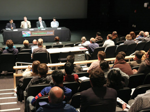 Greenovation panel speakers and audience
