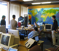 UCSD researchers gather around SIO professor V. Ramanathan and Calit2 director Larry Smarr
