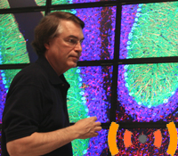 Calit2 Director Larry Smarr with Voice of San Diego logo