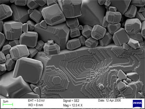 thermal facets on free surface of annealed yttrium-doped strontium titanate (SYT) ceramic pellet