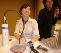 Shannon Spanhake tests personal pollution monitoring device