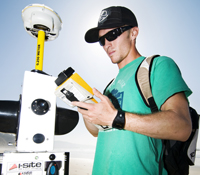 Graduate Student Pat Rentz with the I-Site laser scanner, which shoots out a laser pulse 4,400 times