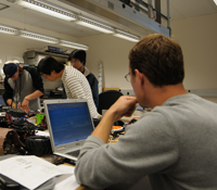 Students in ECE 191 work to equip the Gizmo device with a self-navigating system.