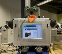 When the Machine Perception Lab robot called RUBI sees a child smiling, she giggles and encourages t