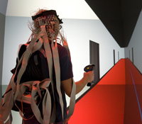 Ed Kezeli, a recent Computer Science and Engineering alumnus of UCSD, serves as a test subject in a