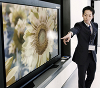 A CineGrid participant views 4K video display