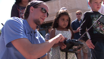  Calit2 researcher Javier Rodriguez with tyke at San Diego Science Festival
