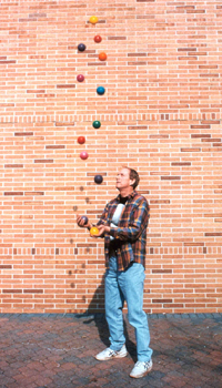 Ron Graham juggling 12 balls