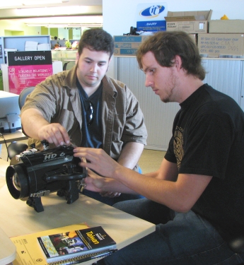 Alex Mathews showing Michael Nekrasov underwater housing