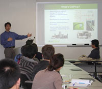 Zhang introduces the students to the research center.