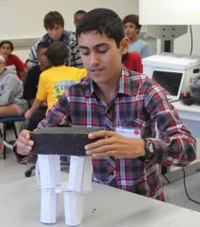 Paul Blair and student demonstrating the device