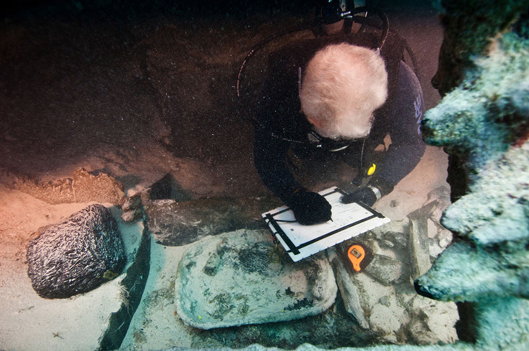 A diver examines the wreck of the Mary Celestia