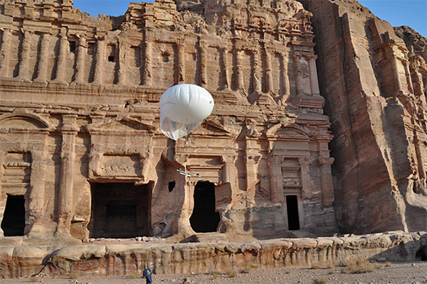 Deploying helium balloon carrying high-def cameras at Royal Tombs in Petra, Jordan