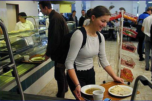 Girl with cafeteria tray