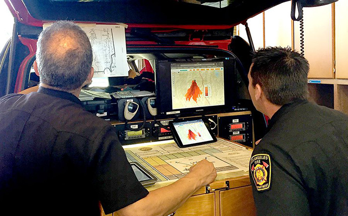 Los Angeles Fire Department personnel use Firemap, a web-based tool developed by UC San Diego researchers, to perform data-driven predictive modeling and analyses of wildfires. Ilkay Altintas/SDSC