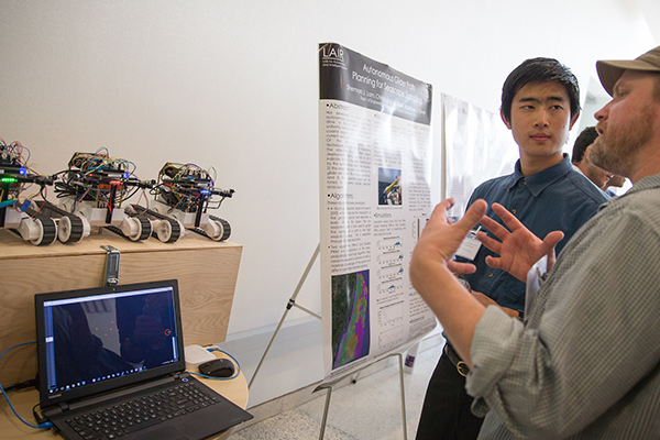 Music Ph.D. candidate Colin Zyskowski demos his networked robots at the Southern California Robotics