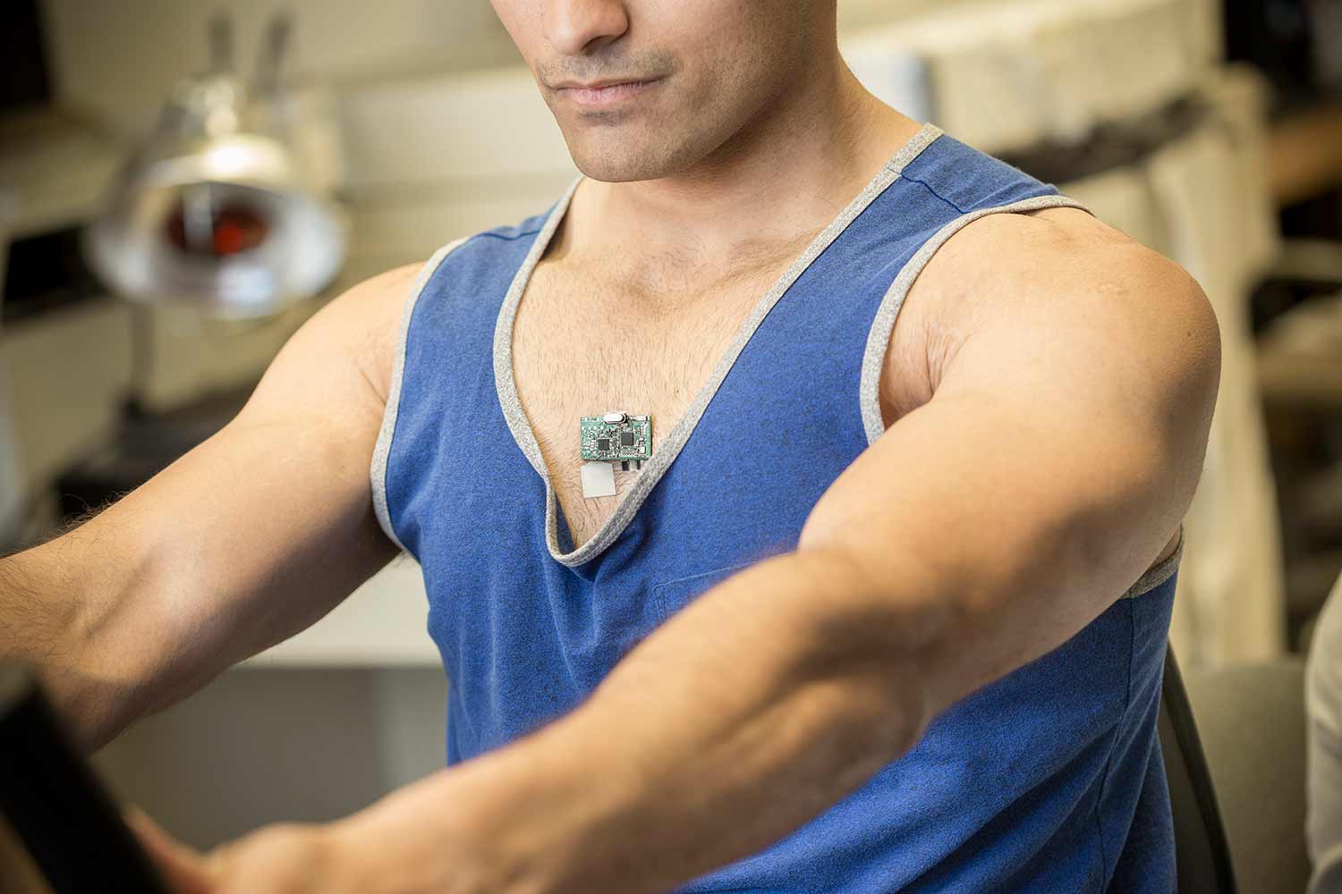 tudy co-author Amay Bandodkar demonstrates how the ChemPhys patch works while riding a stationary bike.