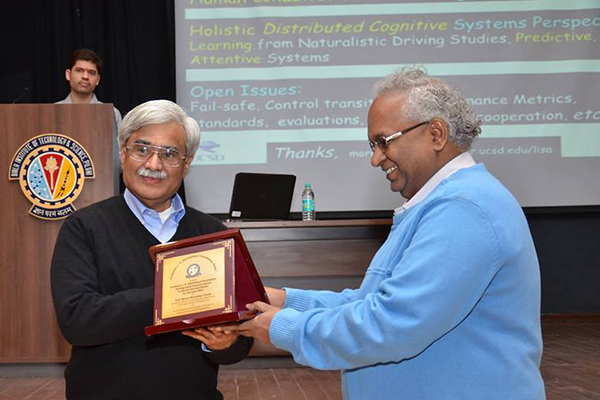 ECE Prof. Mohan Trivedi (front left) accepts alumni award from BITS Pilani, his alma mater.