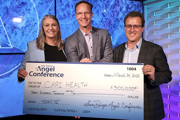 CARI Health team holds check