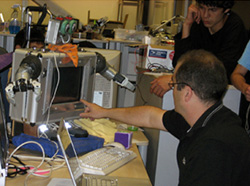 Project Scientist Javier Movellan, pictured here with the RUBI robot, says the Einstein Robot will eventually be used as a prototype robot teacher in a local high school, in much the same way that RUBI has been used to teach pre-schoolers.