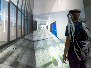 Kezeli makes his way through the unambigious rendering of the New Media Arts Wing at Atkinson Hall. 