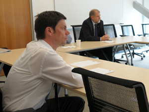 Frank Stietz (in foreground) meets with Jacobs School of Engineering Dean Frieder Seible and other representatitves of Calit2.  