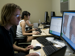 Anthropology/Classical Studies major Eric Olson (foreground) and anthropology/biology major Charlene Wang are working to create a Digital Pottery Informatics Database that will help archaeologists create 3-D renderings of pottery, even when only fragments are available.