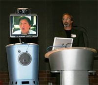 Yulun Wang participates via robot
